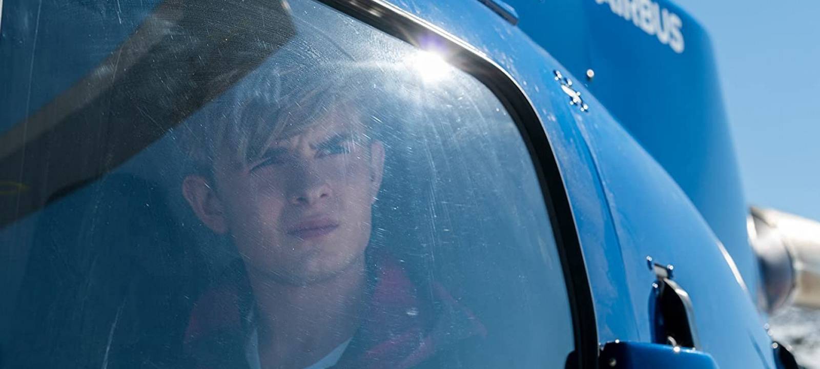 Alex im Hubschrauber.