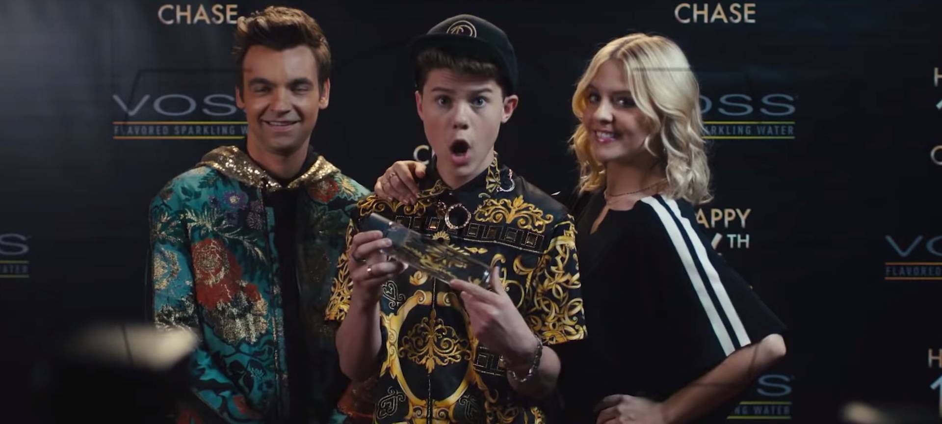 Die drei Geschwister auf einer Preisverleihung.